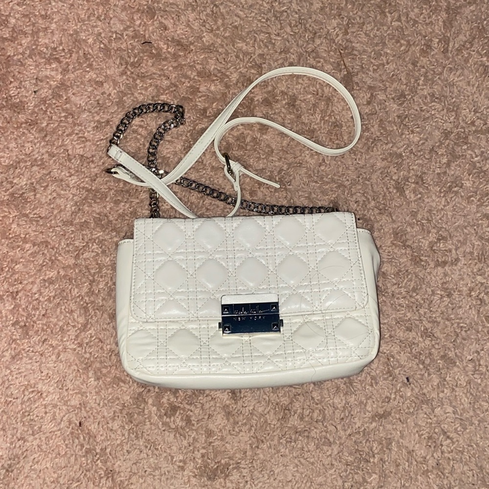 White purse shoulder